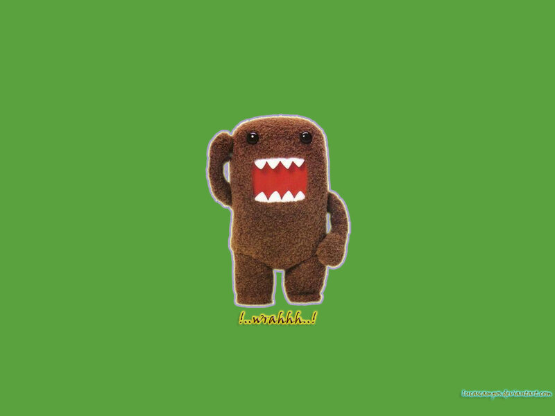 Domo character on green background