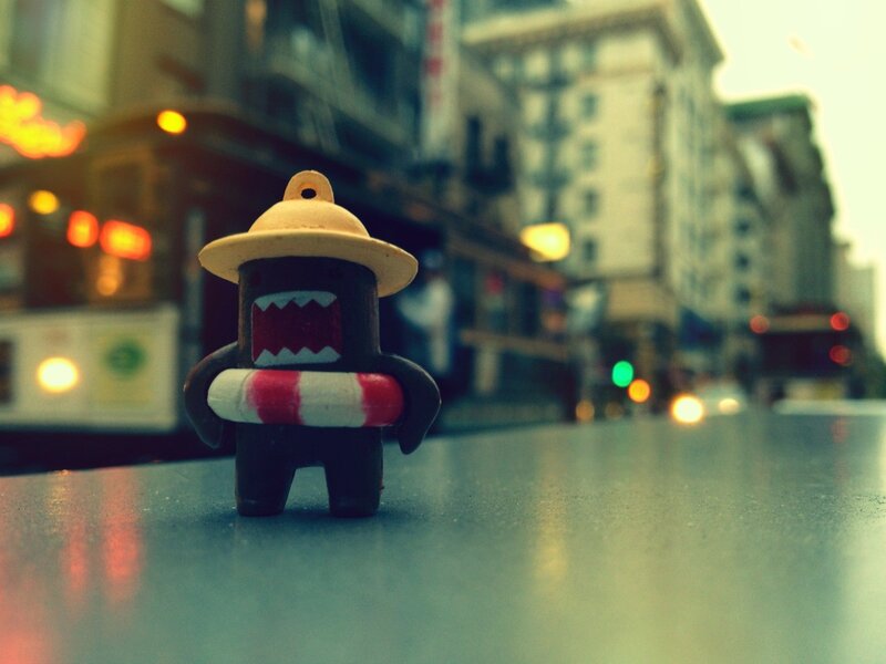 Domo figure on city street