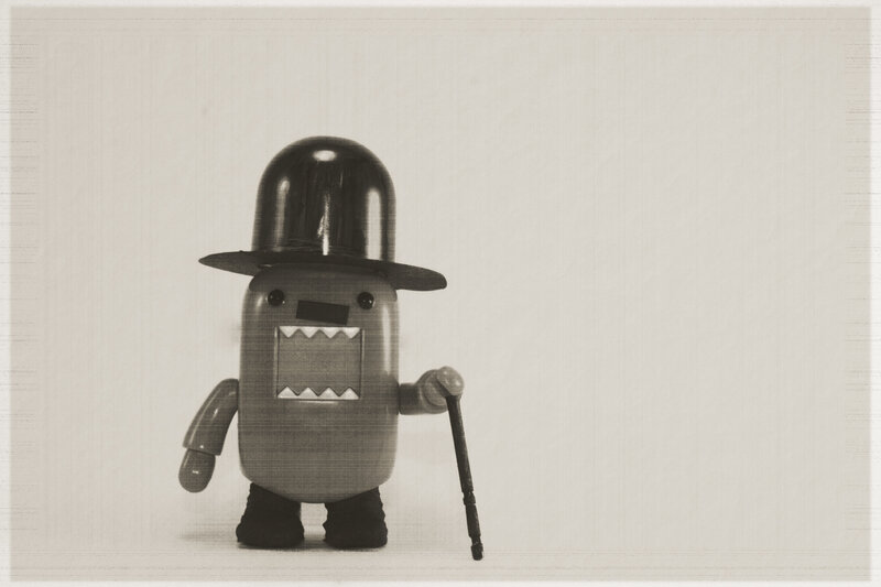 Domo figure with cane