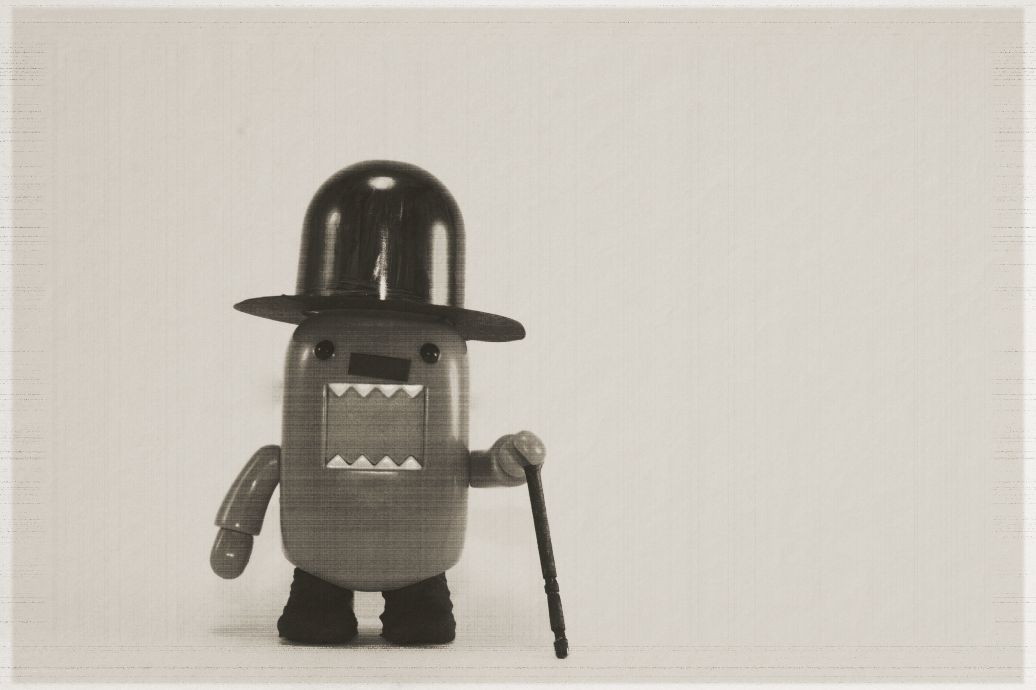 Domo figure with cane