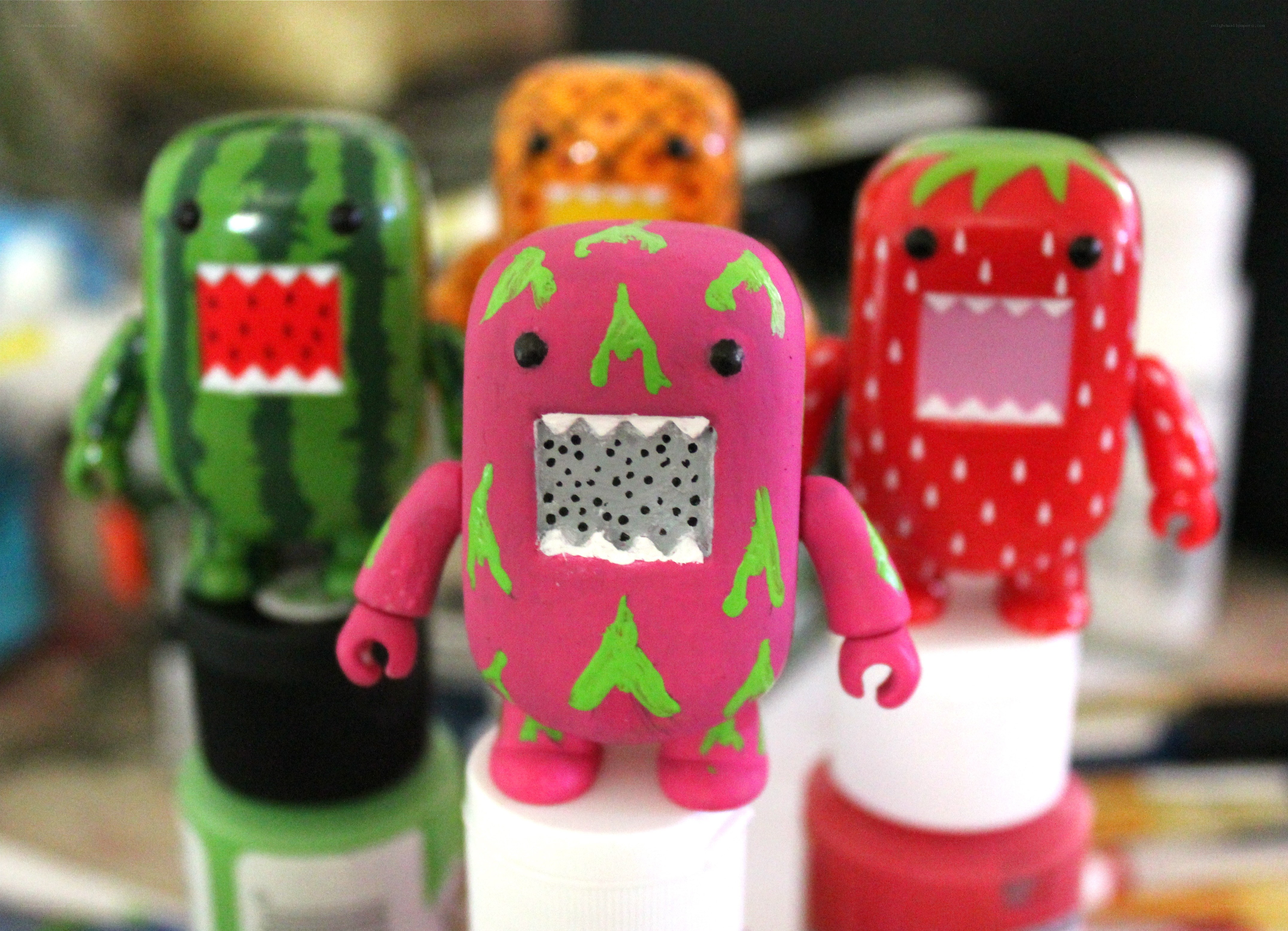 Domo figures in fruit designs