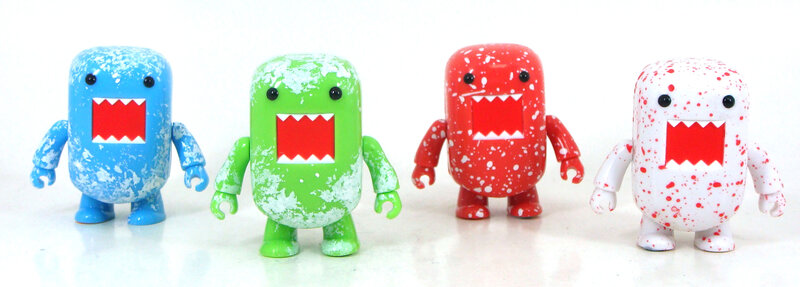 Domo figures in splatter paint