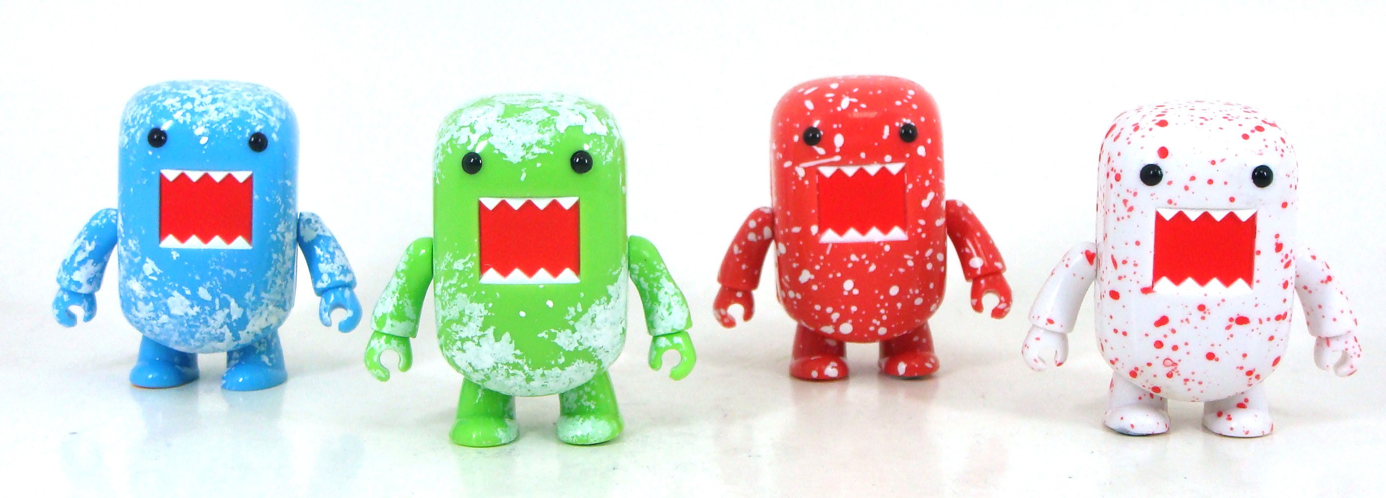 Domo figures in splatter paint