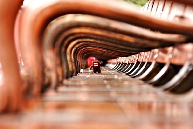 Domo Figurine on Bench