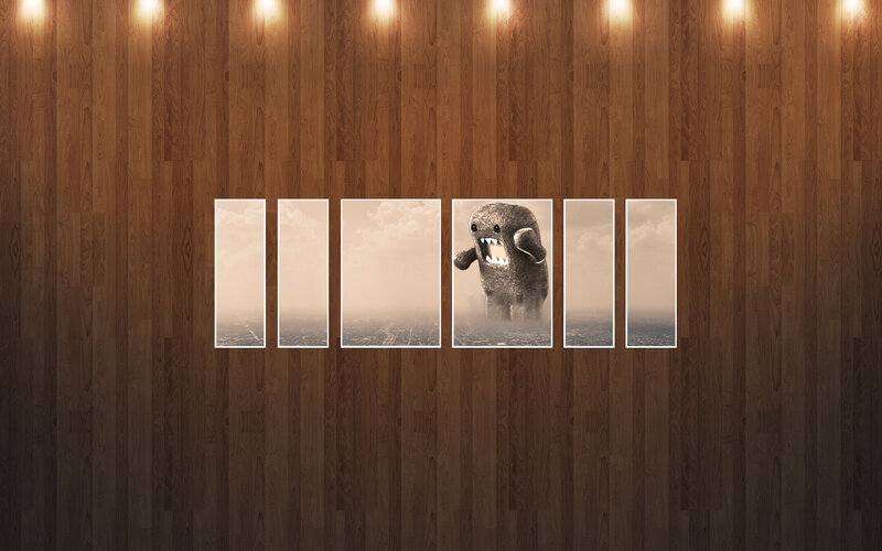 Domo monster on wooden wall