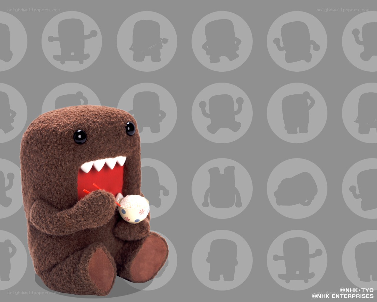 Domo plush eating rice