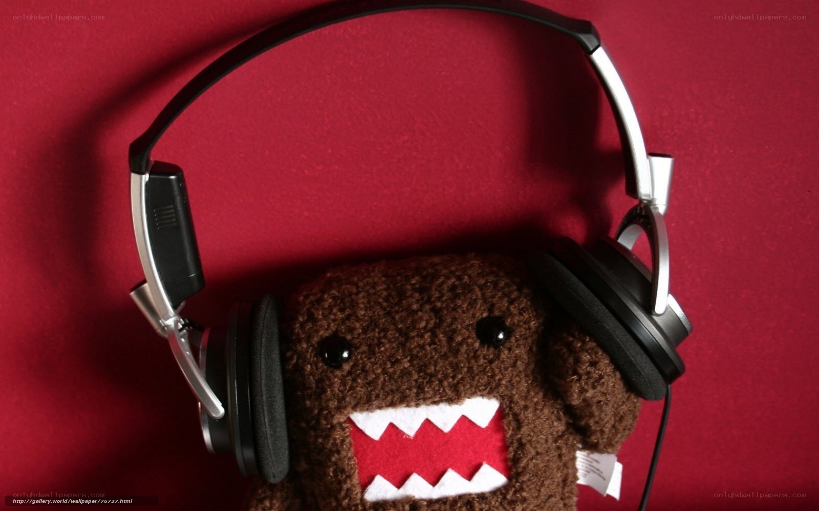 Domo plush with headphones