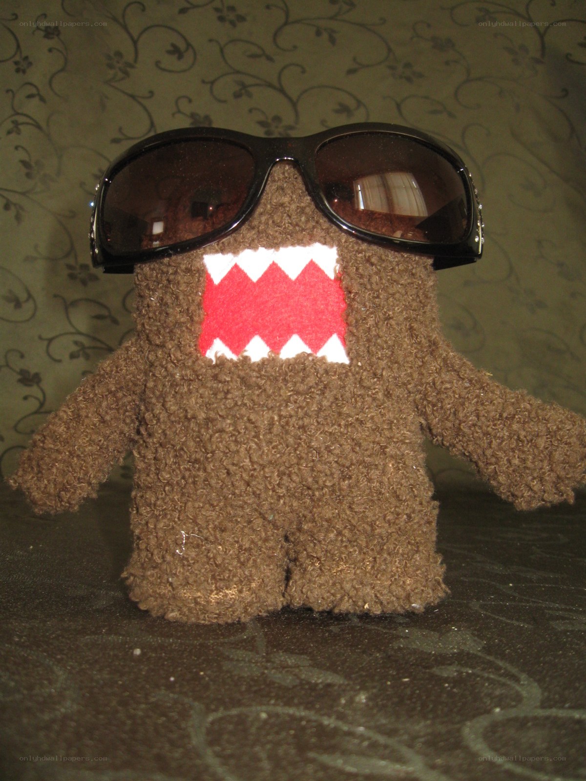 Domo plush with sunglasses