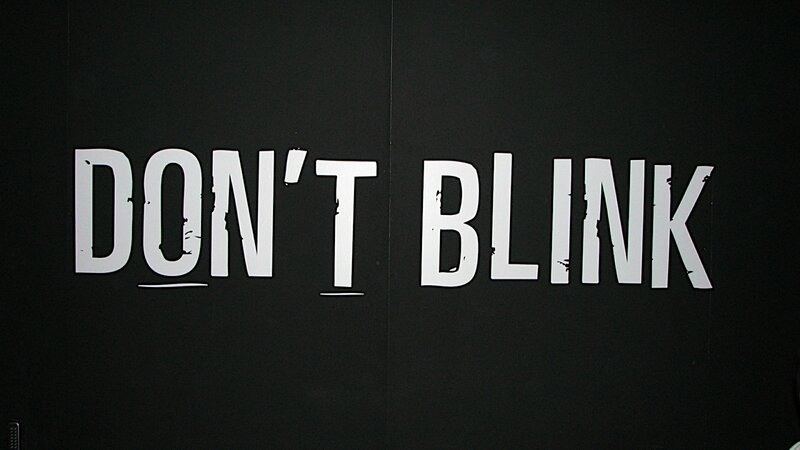 don't blink text on black wall