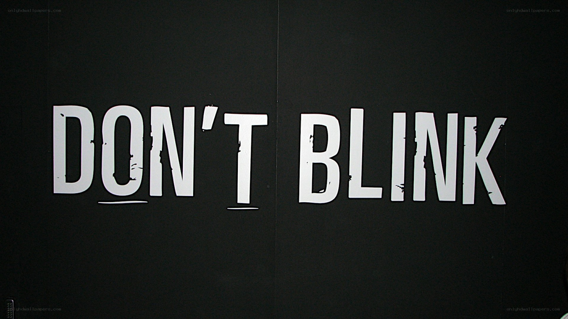don't blink text on black wall