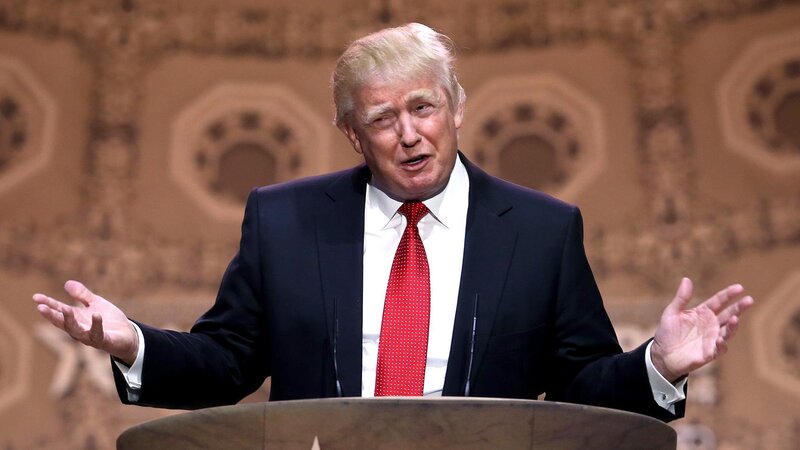 Donald Trump speaking at podium