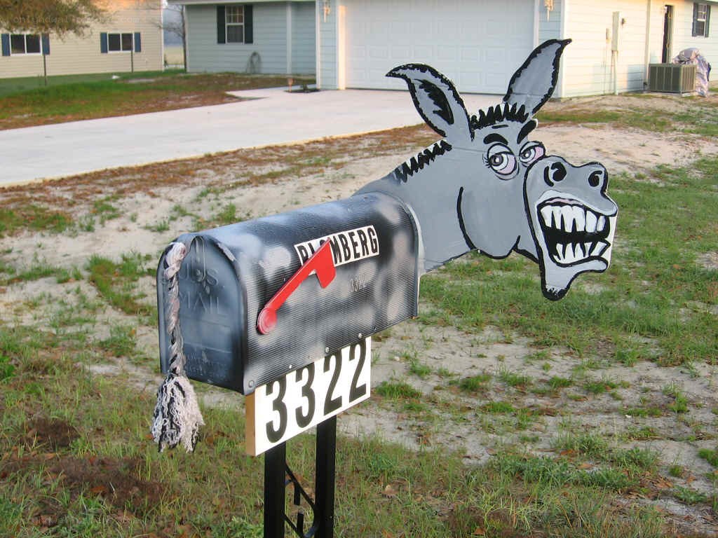 Donkey-themed mailbox in yard