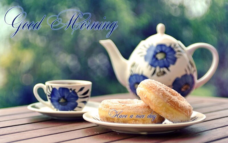 Donuts and Teapot on Table