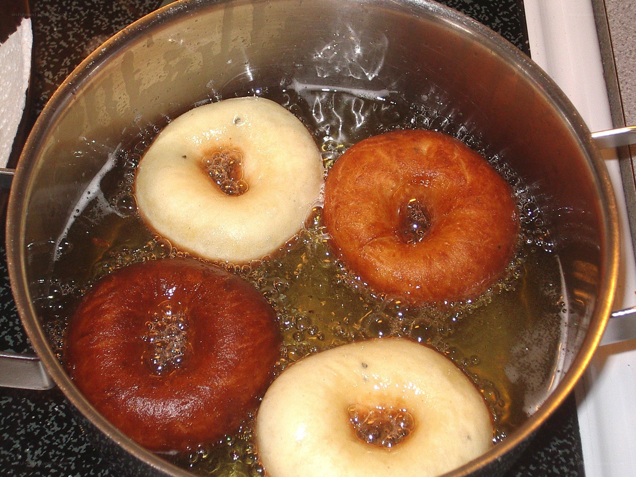 donuts frying in oil