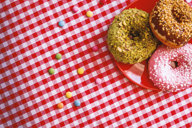 donuts on checkered tablecloth
