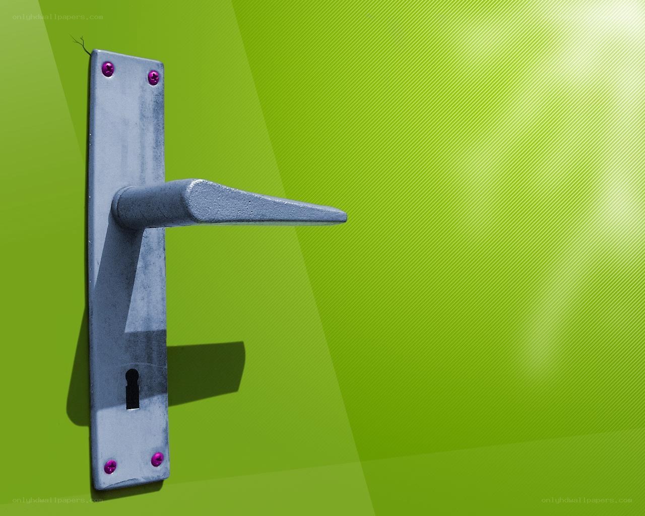 door handle on green door