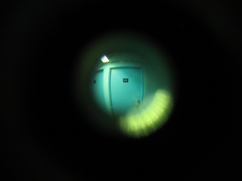 door viewed through peephole