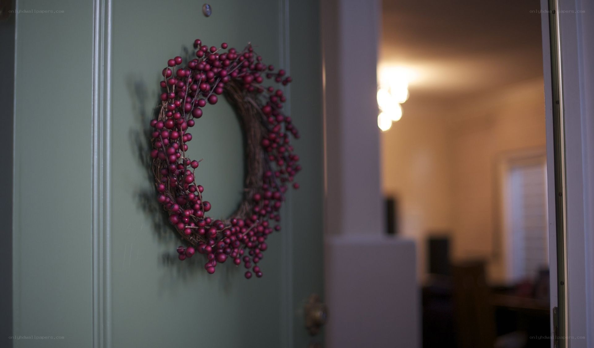 door with berry wreath