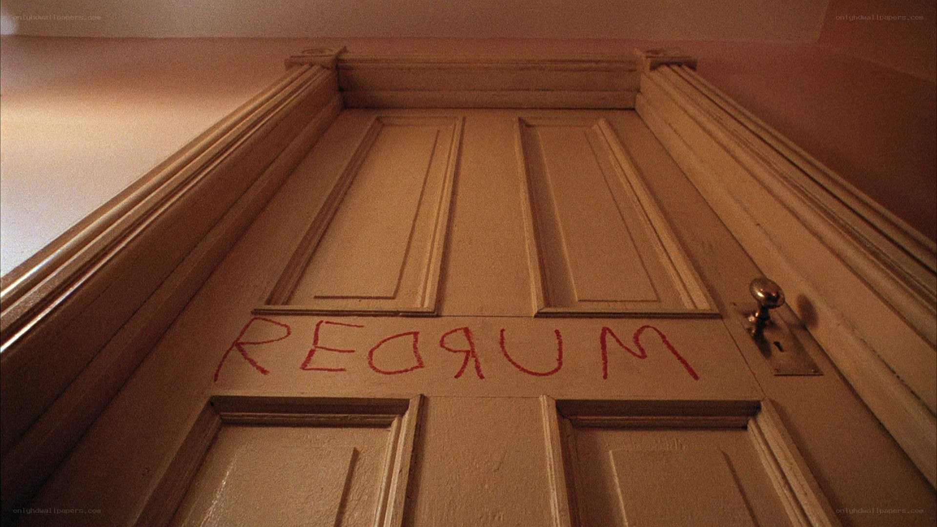 Door with 'MURDER' written on it
