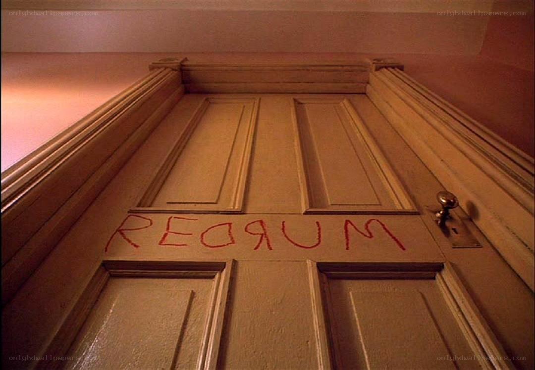 door with red graffiti