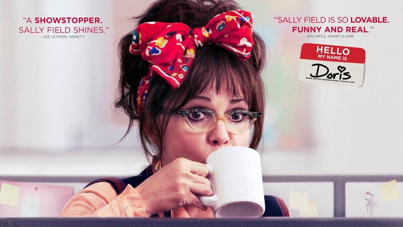 Doris drinking coffee at work