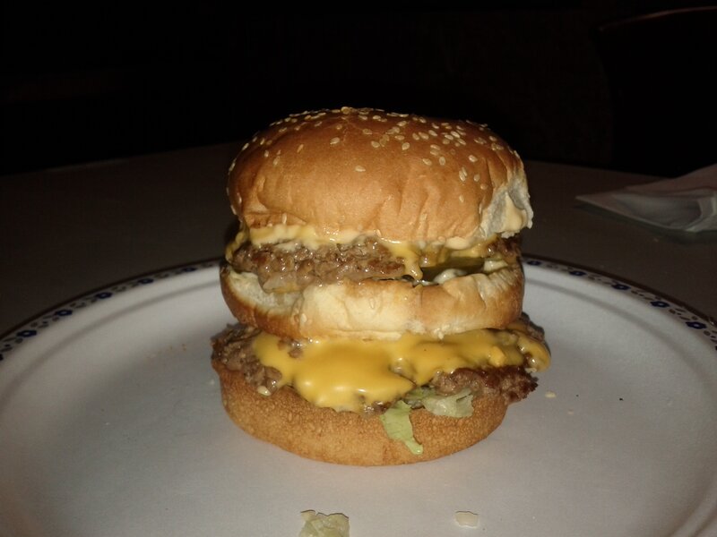 Double cheeseburger on plate