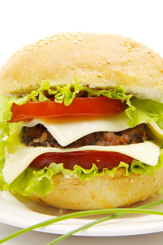 Double cheeseburger with lettuce and tomato