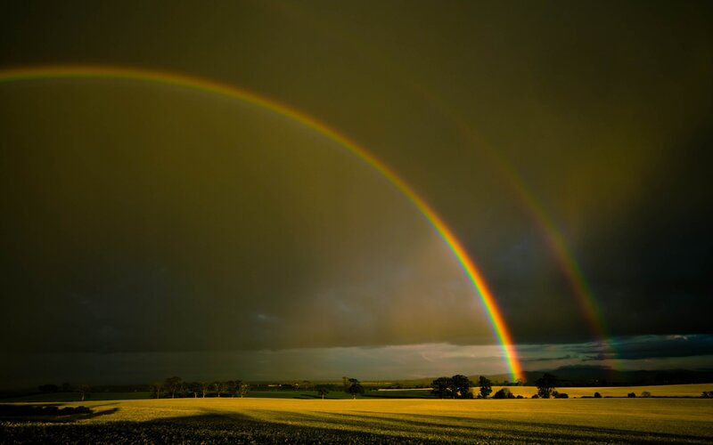 Double rainbow over a field
