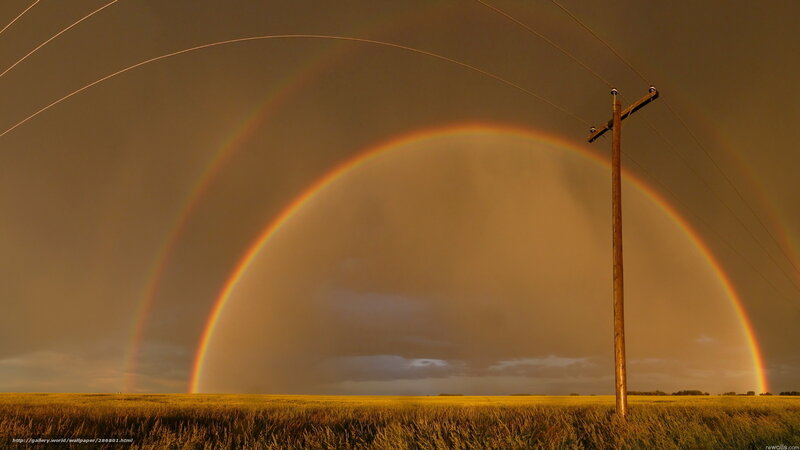 Double rainbow over field