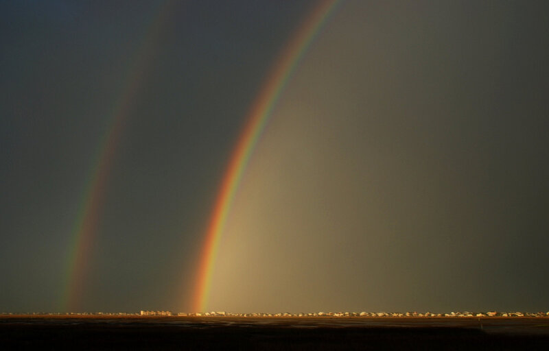 Double Rainbow over Landscape