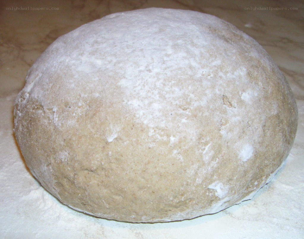 dough ball on floured surface