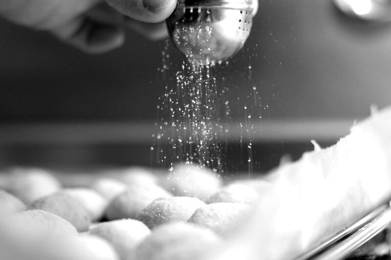 Dough Balls Being Dusted