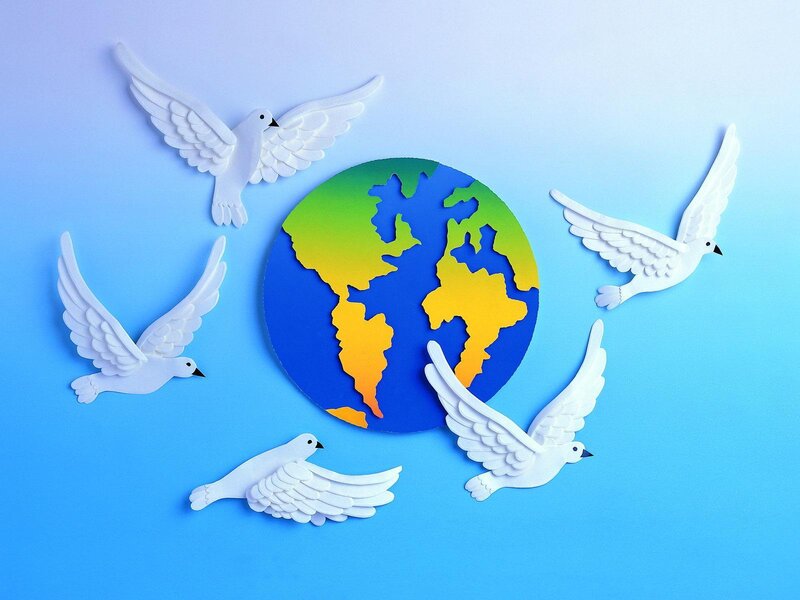 doves circling the globe