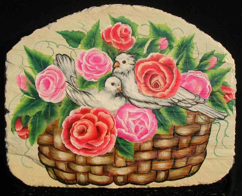 Doves in a basket of roses