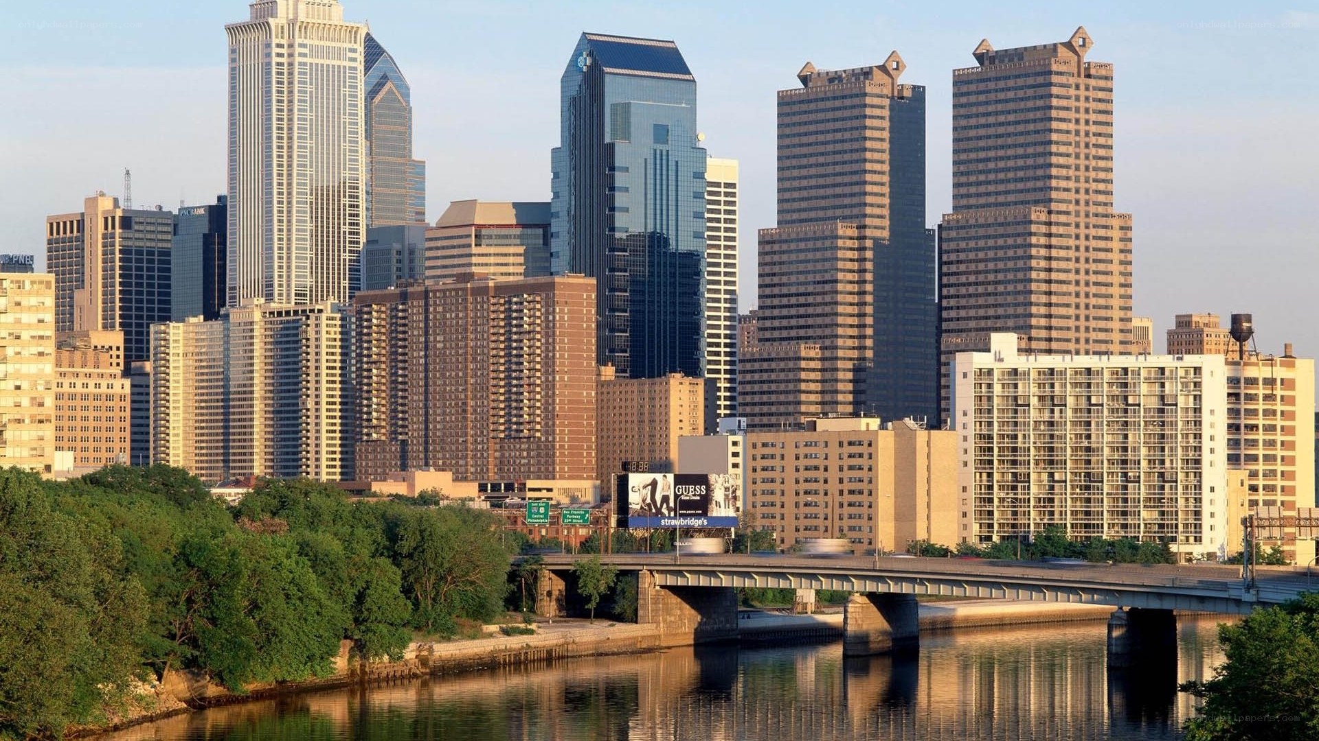 downtown skyline with river and bridge