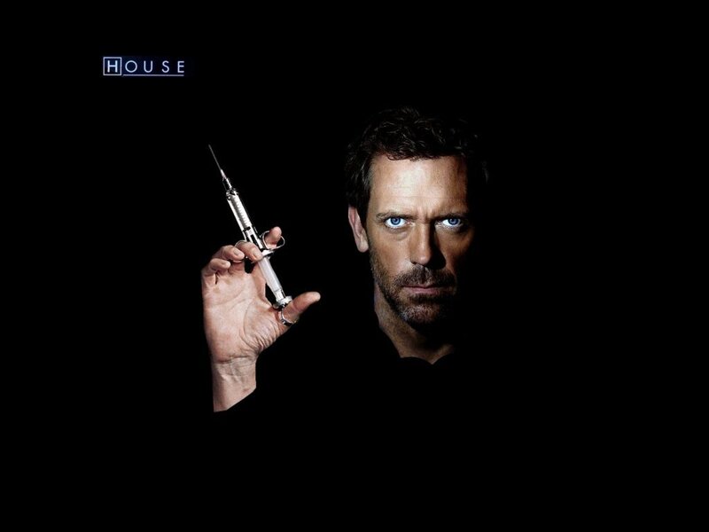 Dr. House holding a syringe