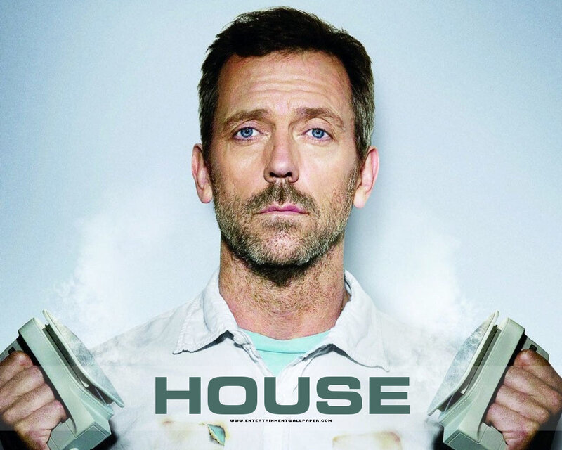 Dr. House holding medical tools