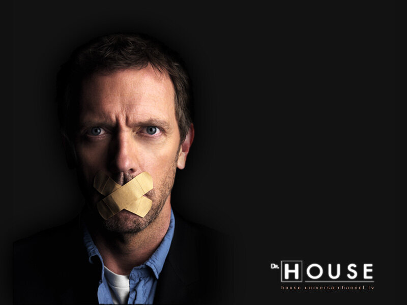 Dr. House with tape over mouth