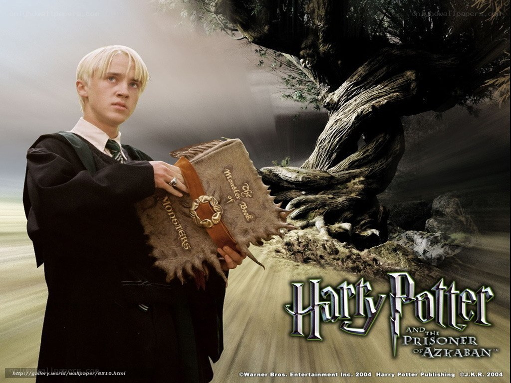 Draco Malfoy with Monster Book