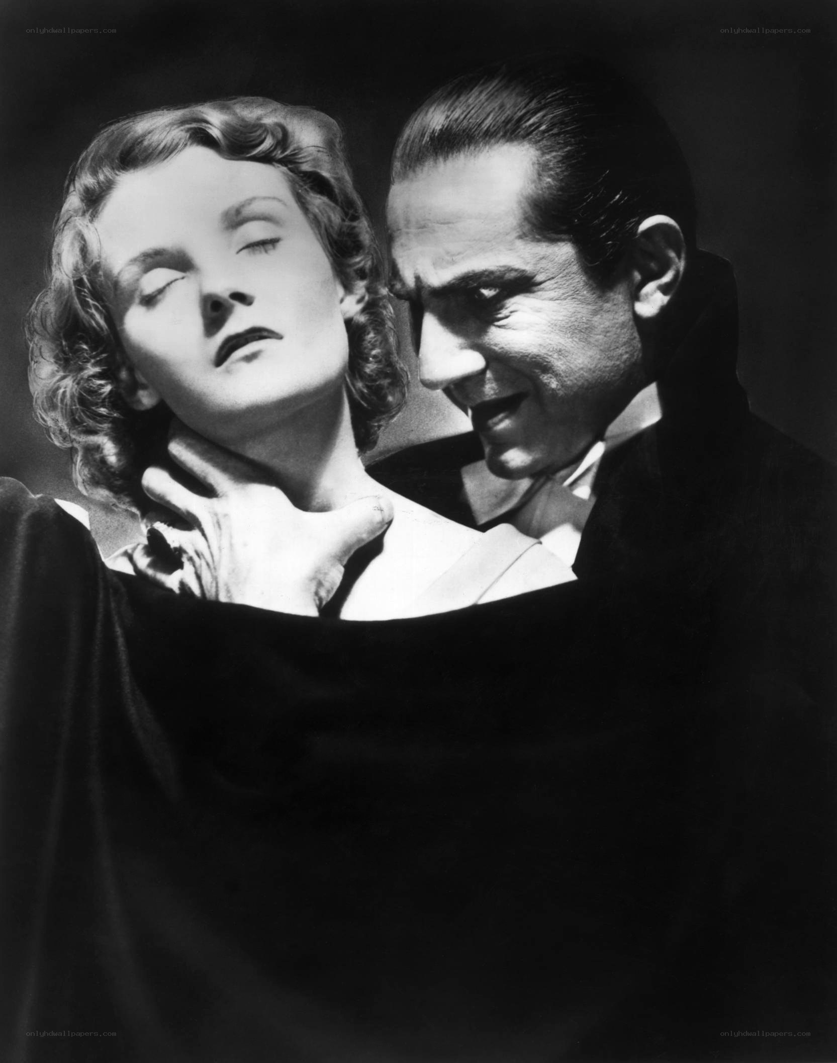 Dracula holds a woman