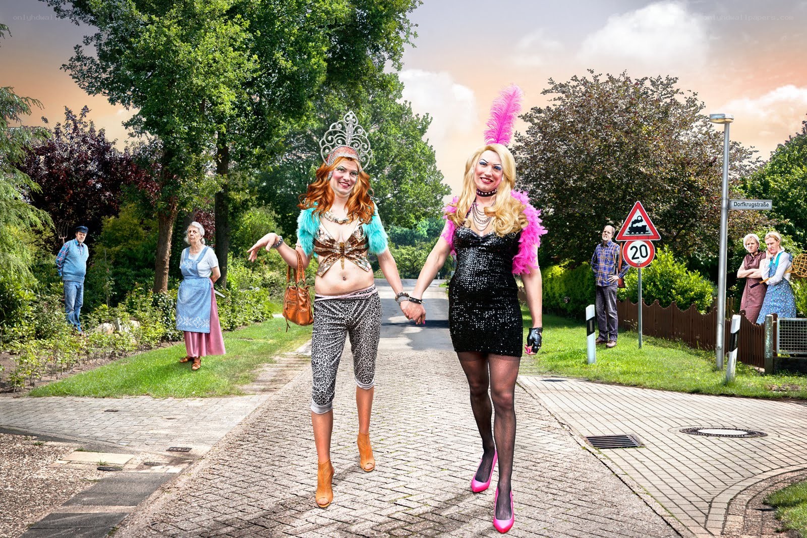 Drag queens walking on a street