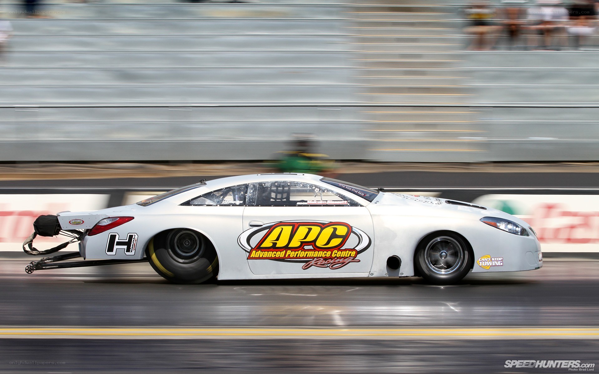 drag racing car in motion