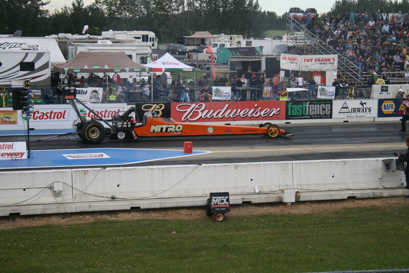 Drag Racing Car on Track — Orange, Active