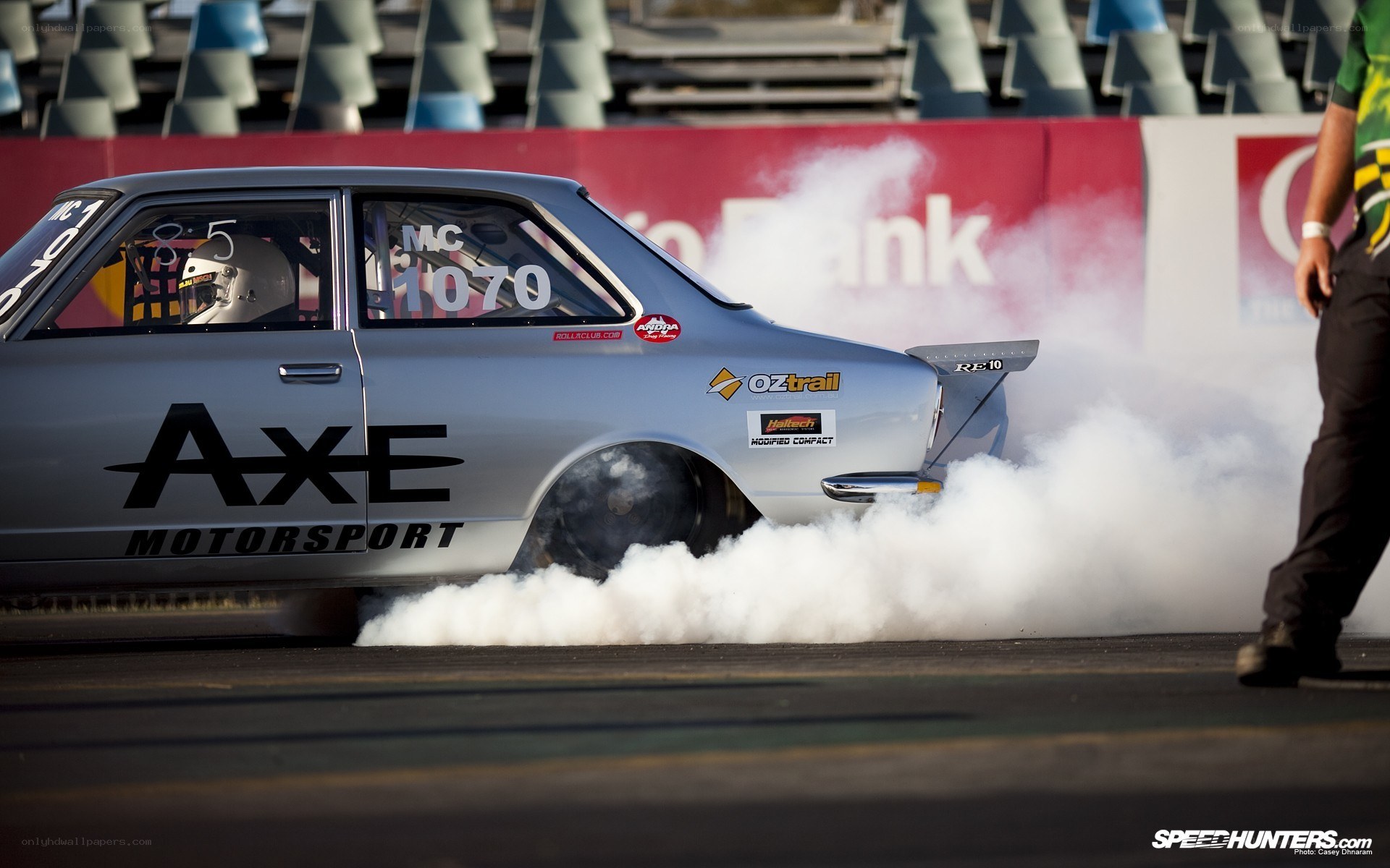 Drag racing car performing burnout