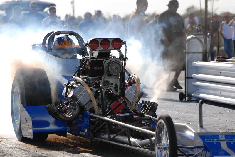 drag racing car with smoke