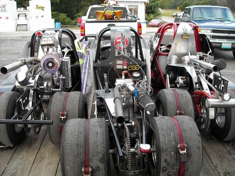 drag racing cars on a trailer