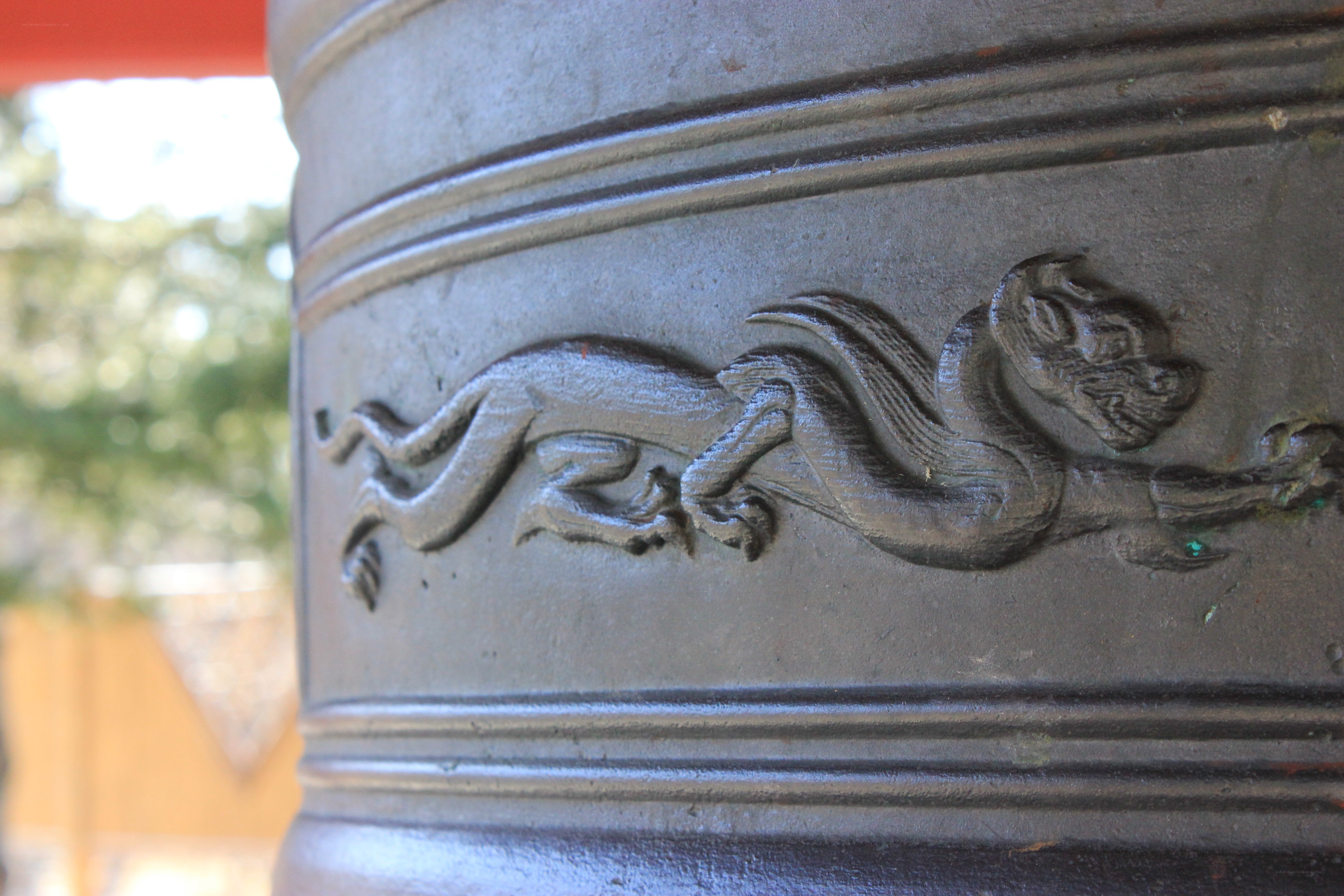 dragon carving on a bell