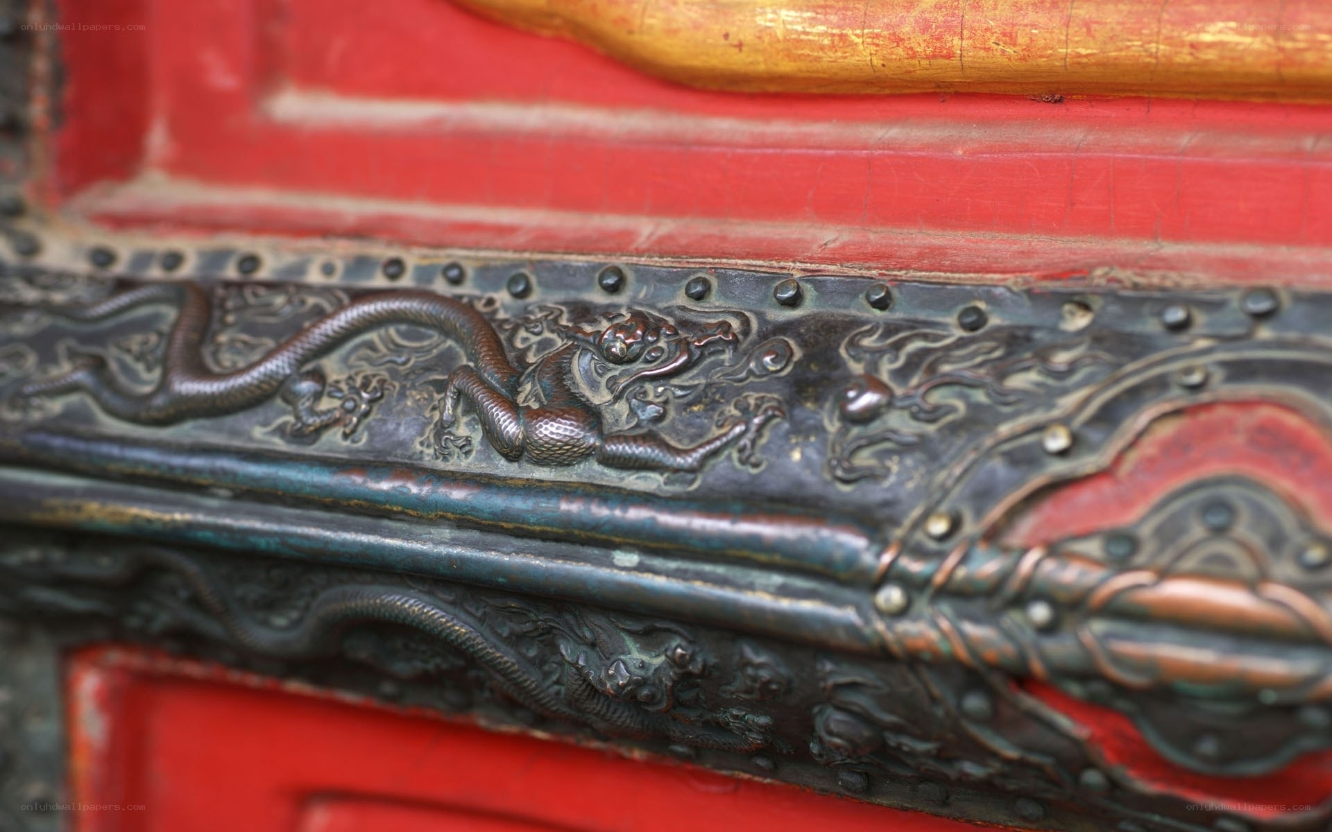 dragon carving on red door