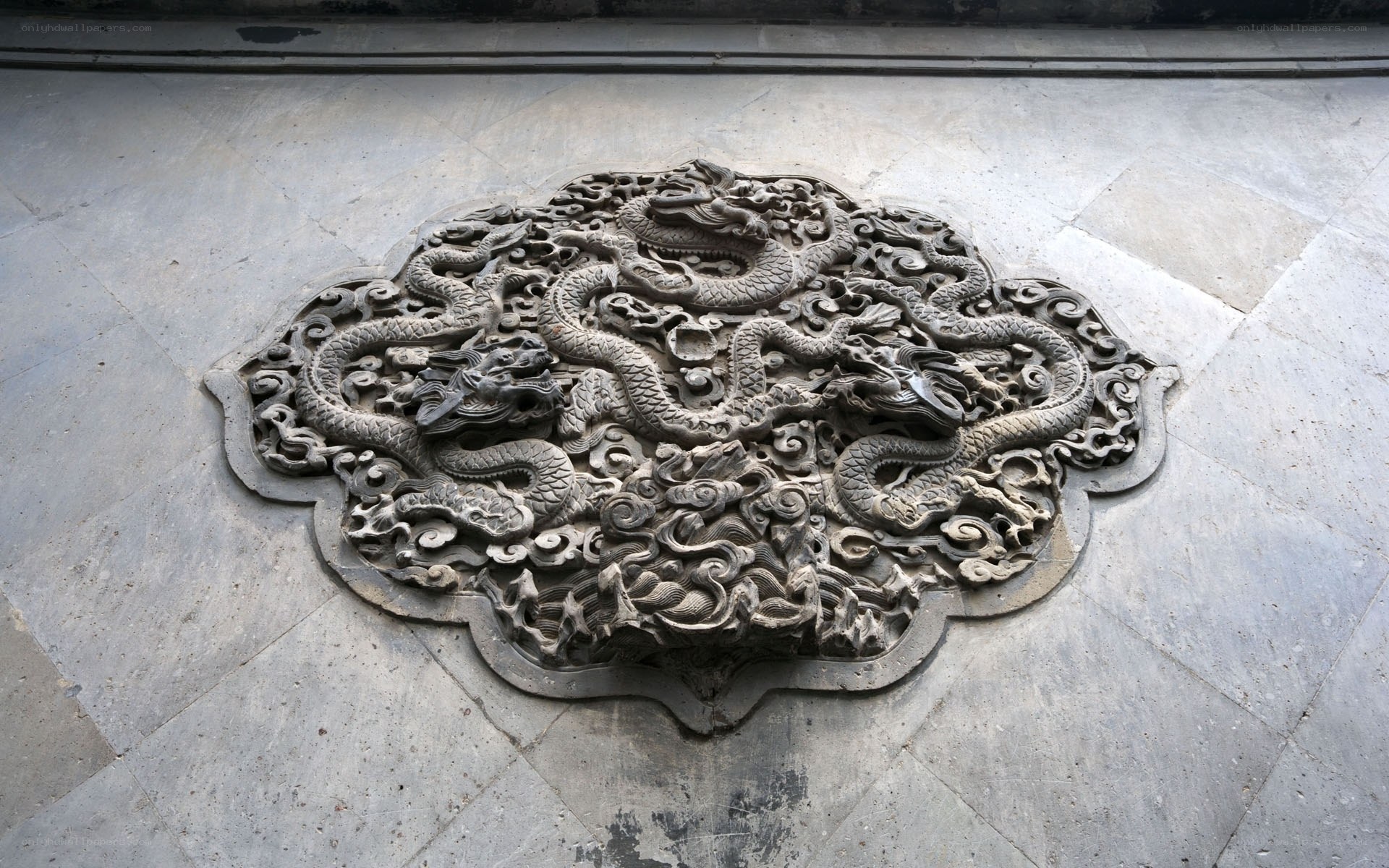 Dragon carving on stone wall