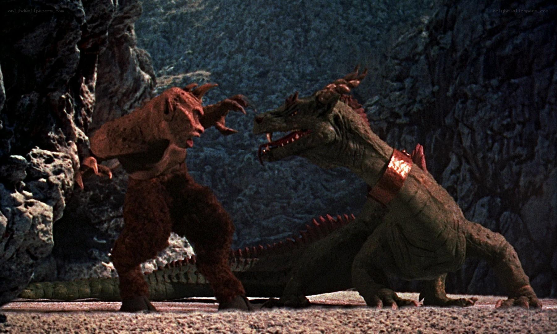dragon confronts creature in cave
